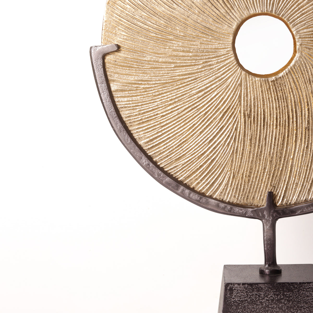 The Solstice Fluted Metal Disc Sculpture